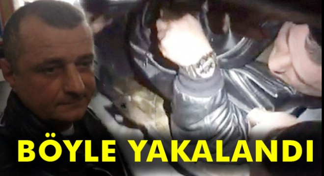Sarp Sınır Kapısı'nda otomobilin gizli bölmesinde yakalandı